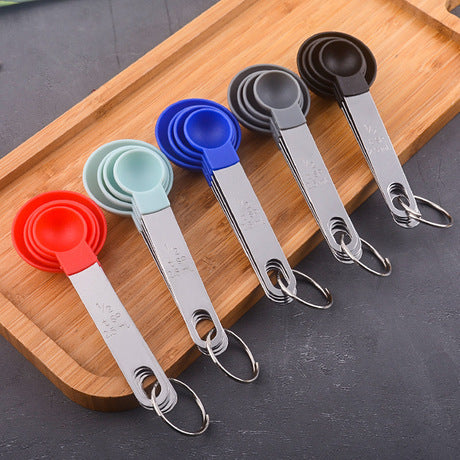 Measuring cup with stainless steel handle