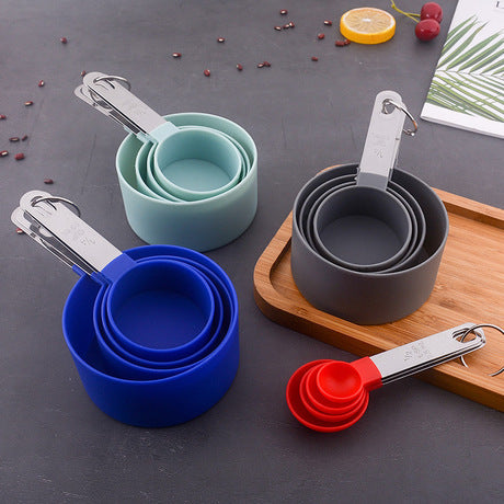 Measuring cup with stainless steel handle