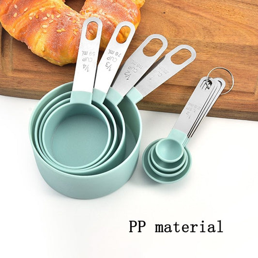 Measuring cup with stainless steel handle